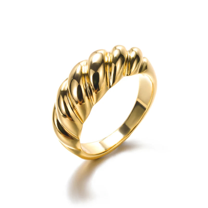 A boho-inspired gold ring with a wavy texture.