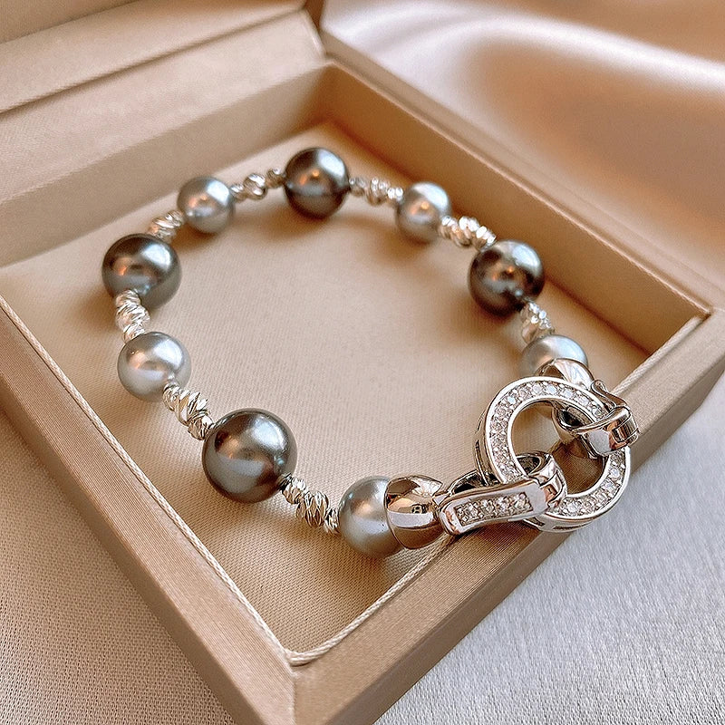 A beautiful bracelet with white and golden south sea pearls and a crystal clasp.